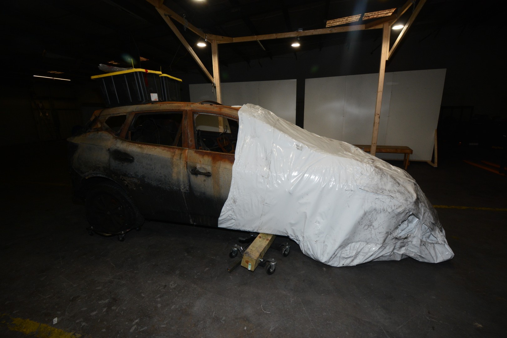Burned vehicle wrapped at lab